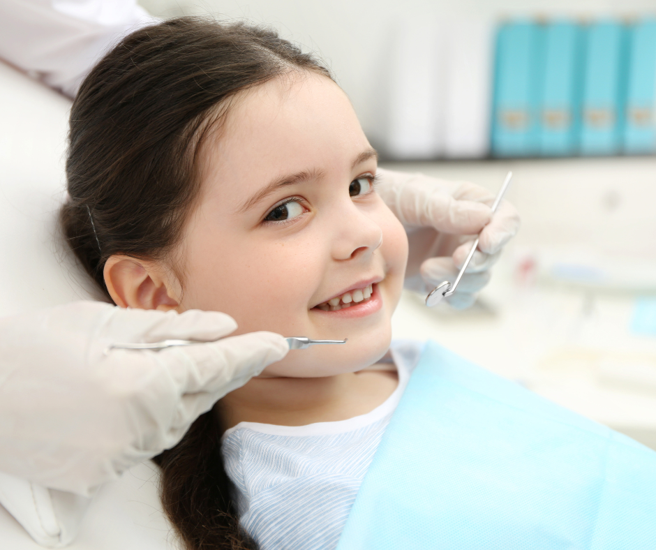 Small Child getting care at a family dentist in University City